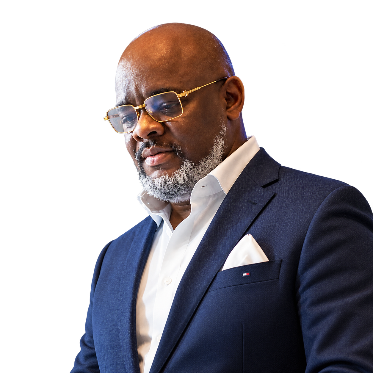 Deji Mabogunje in a navy suit and glasses